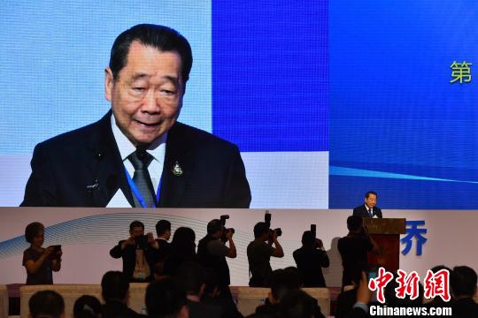 圖爲正大集團資深董事長謝國民演講。 胡遠航 攝